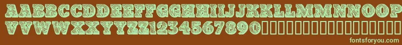 Paisleycaps Font – Green Fonts on Brown Background