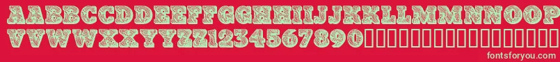 Paisleycaps Font – Green Fonts on Red Background