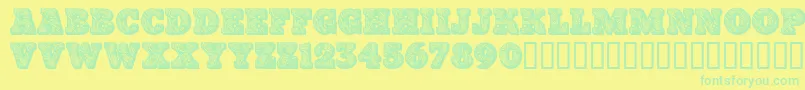 Paisleycaps Font – Green Fonts on Yellow Background