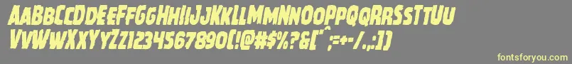 フォントHowlinmadcondital – 黄色のフォント、灰色の背景
