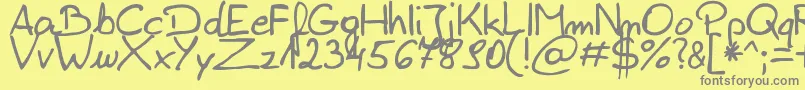 ZaiEdsloppysimple-fontti – harmaat kirjasimet keltaisella taustalla