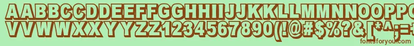 OmniblackOutlineDemo-fontti – ruskeat fontit vihreällä taustalla
