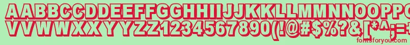 OmniblackOutlineDemo-fontti – punaiset fontit vihreällä taustalla