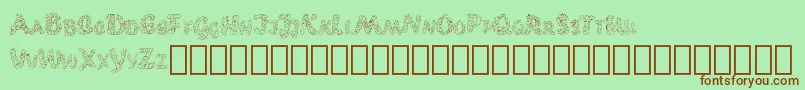 Popcornebo-Schriftart – Braune Schriften auf grünem Hintergrund