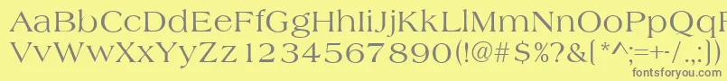 AlmeriaRegular-fontti – harmaat kirjasimet keltaisella taustalla