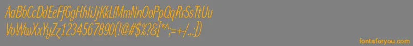 フォントDynagrotesklxcItalic – オレンジの文字は灰色の背景にあります。