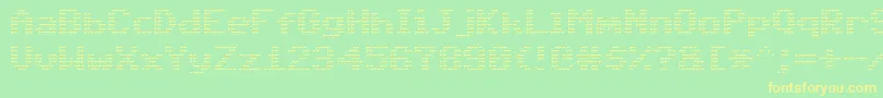 フォントTriad – 黄色の文字が緑の背景にあります