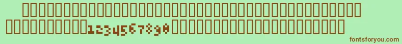 6pxExpert-Schriftart – Braune Schriften auf grünem Hintergrund
