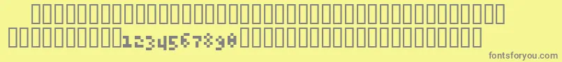 フォント6pxExpert – 黄色の背景に灰色の文字