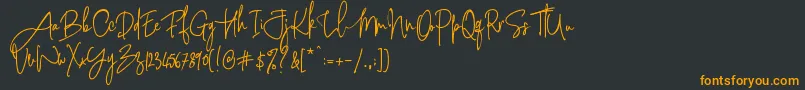 フォントPinkScriptR1 – 黒い背景にオレンジの文字