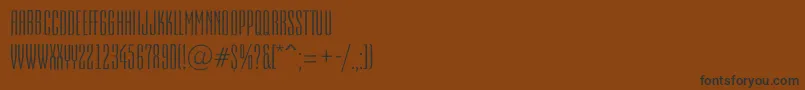 Шрифт EmpirialrgRegular – чёрные шрифты на коричневом фоне