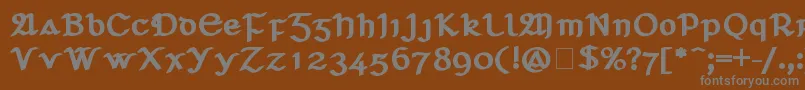 フォントSeanchlГіDubh – 茶色の背景に灰色の文字