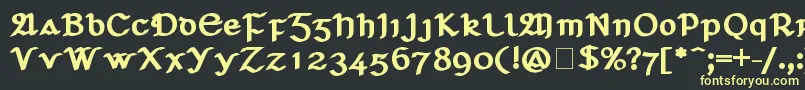 フォントSeanchlГіDubh – 黒い背景に黄色の文字
