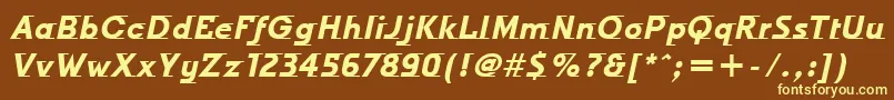 OdysseeItcTtBolditalic-fontti – keltaiset fontit ruskealla taustalla