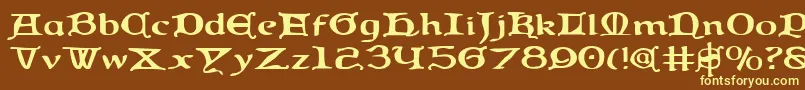 QueenCountryExpanded Font – Yellow Fonts on Brown Background