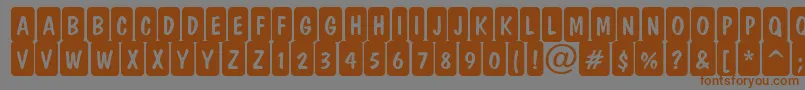 ADominocmrndcrn Font – Brown Fonts on Gray Background
