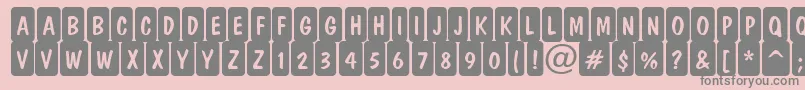 ADominocmrndcrn-Schriftart – Graue Schriften auf rosa Hintergrund