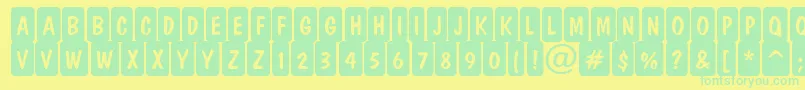 ADominocmrndcrn Font – Green Fonts on Yellow Background