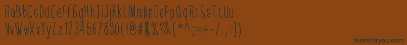 フォントThinfont – 黒い文字が茶色の背景にあります