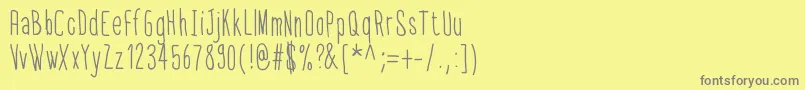 フォントThinfont – 黄色の背景に灰色の文字