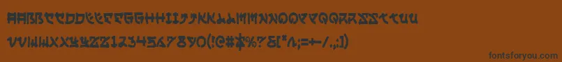 YamaMotoCondensed-fontti – mustat fontit ruskealla taustalla