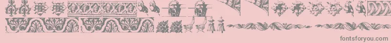Lisätietoja OldOrnaments-fontista OldOrnaments-fontti – harmaat kirjasimet vaaleanpunaisella taustalla
