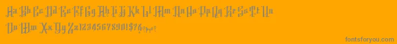 K22AngularText-Schriftart – Graue Schriften auf orangefarbenem Hintergrund