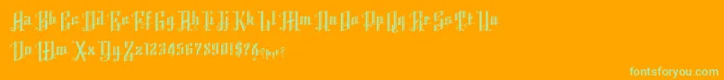 K22AngularText-Schriftart – Grüne Schriften auf orangefarbenem Hintergrund