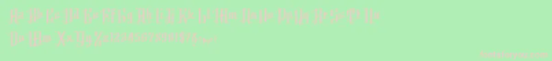 K22AngularText-fontti – vaaleanpunaiset fontit vihreällä taustalla