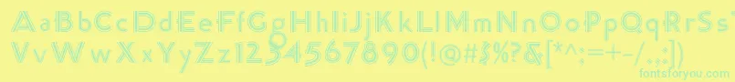 K22TriLineGothic Font – Green Fonts on Yellow Background