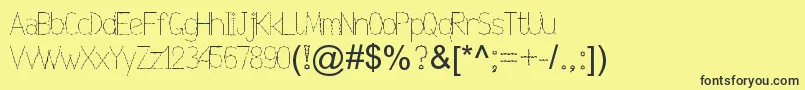 Nexarumpelstil Font – Black Fonts on Yellow Background
