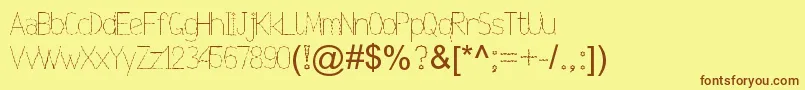 Nexarumpelstil Font – Brown Fonts on Yellow Background