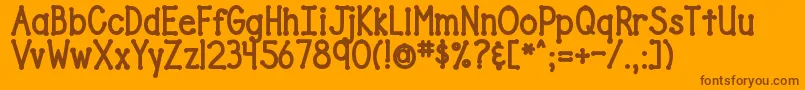 DjbDrivesMeDotty-Schriftart – Braune Schriften auf orangefarbenem Hintergrund