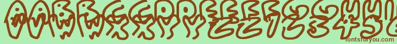 AlmostOutlines Font – Brown Fonts on Green Background
