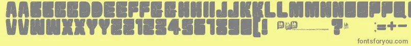 フォントVelvetdrop – 黄色の背景に灰色の文字
