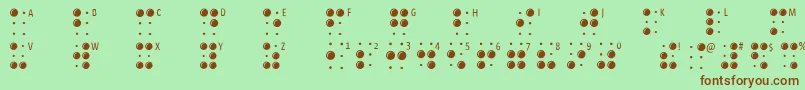 Fonte Braillelatin – fontes marrons em um fundo verde