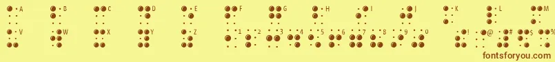 フォントBraillelatin – 茶色の文字が黄色の背景にあります。