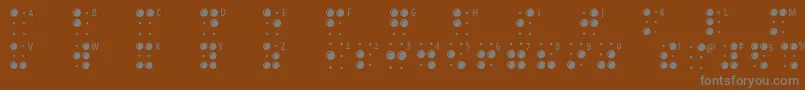 フォントBraillelatin – 茶色の背景に灰色の文字