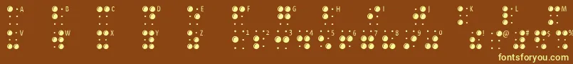 Braillelatin-Schriftart – Gelbe Schriften auf braunem Hintergrund