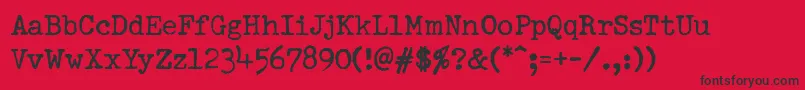 PfdumboldtypewriterOneNormal Font – Black Fonts on Red Background