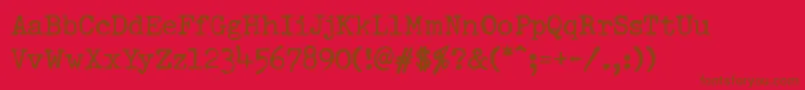 Saiba mais sobre a fonte PfdumboldtypewriterOneNormal Fonte PfdumboldtypewriterOneNormal – fontes marrons em um fundo vermelho