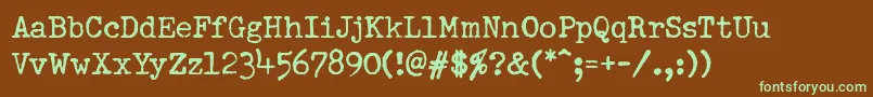 フォントPfdumboldtypewriterOneNormal – 緑色の文字が茶色の背景にあります。