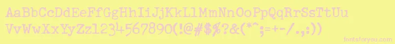 PfdumboldtypewriterOneNormal-fontti – vaaleanpunaiset fontit keltaisella taustalla