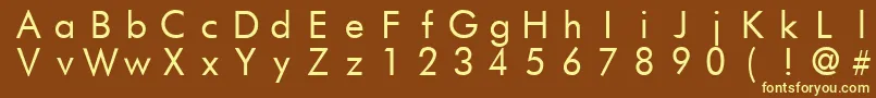 FuturistFixedWidth-fontti – keltaiset fontit ruskealla taustalla