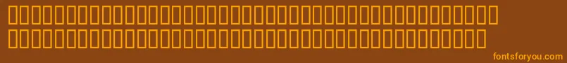 フォントMcsAlmaalim – オレンジ色の文字が茶色の背景にあります。