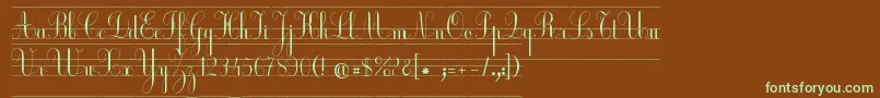 フォントEcolierCp – 緑色の文字が茶色の背景にあります。