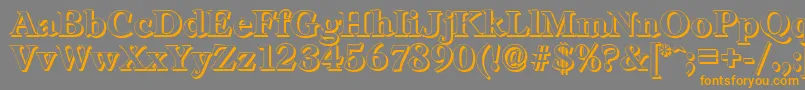 LeamingtonshadowBold-Schriftart – Orangefarbene Schriften auf grauem Hintergrund