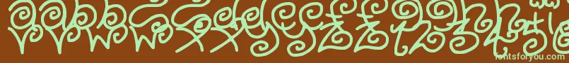 Więcej informacji o czcionce KurlyKyoots Czcionka KurlyKyoots – zielone czcionki na brązowym tle