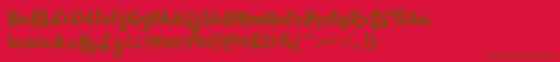 フォントGradies – 赤い背景に茶色の文字