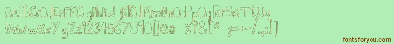 IndietronicaThin-Schriftart – Braune Schriften auf grünem Hintergrund